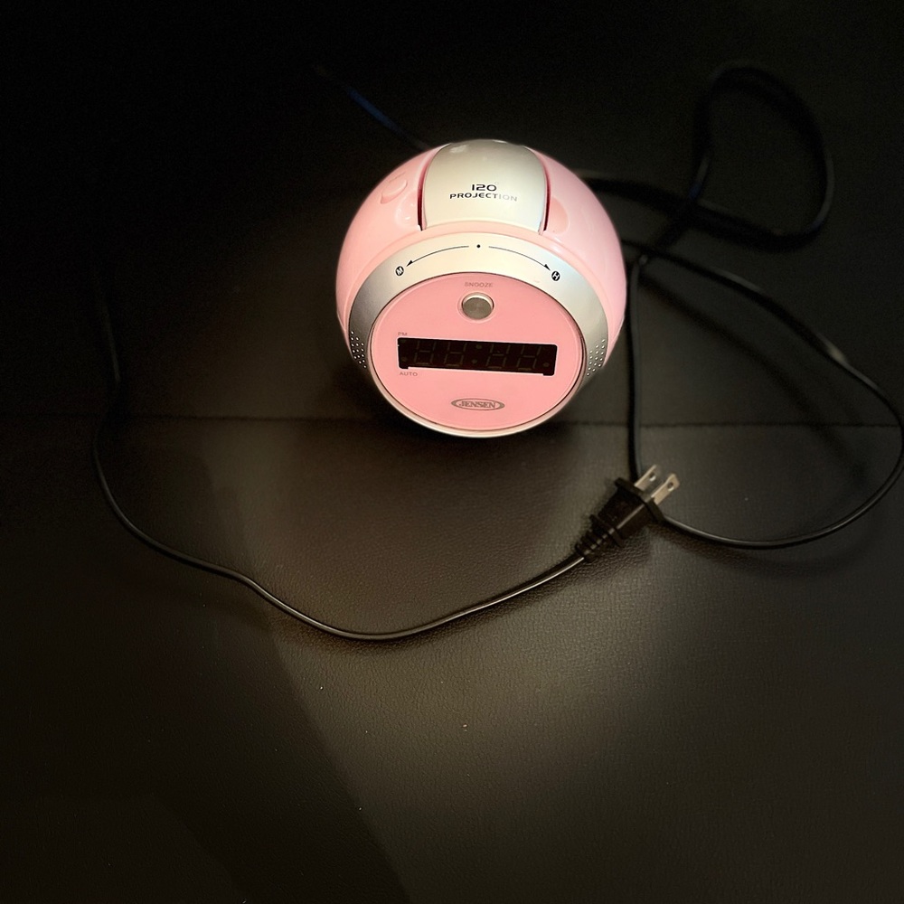 Jensen Pink Alarm Clock with Radio and Projector